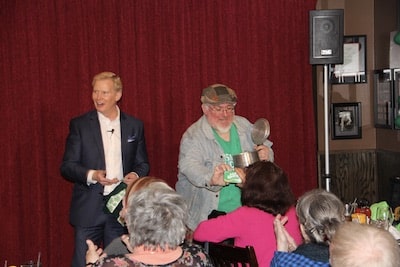 tim-hall-magician-performs-with-comedian-on-stage