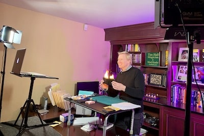 virtual-zoom-magician-tim-hall-performs-magic-show-fire-coming-out-of-wallet