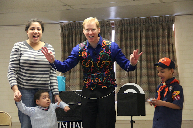 tim hall tears and restores piece of string during a cub scout blue and gold banquet